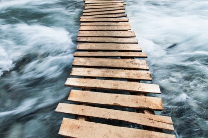 Wooden boardwalk across water